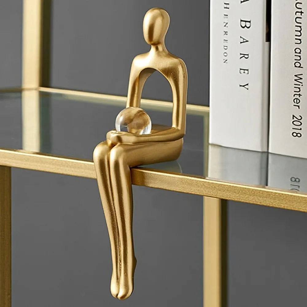 Golden Thinking Person Statue