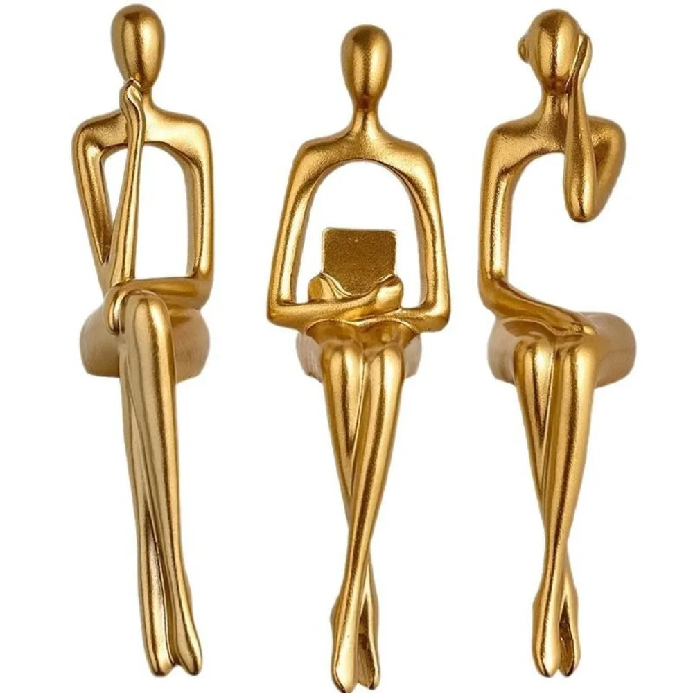 Golden Thinking Person Statue